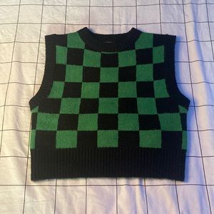 A checkered pattern sweater vest
